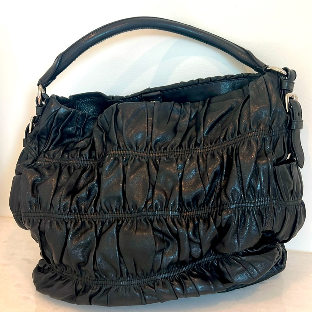 Prada blacked ruched leather handbag